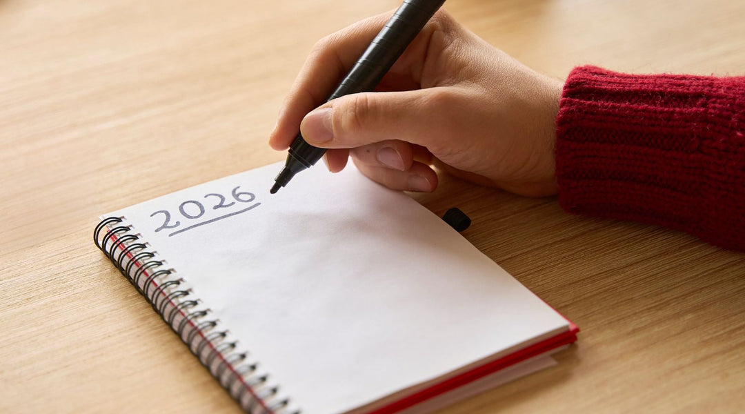 "2026" written on a notebook, setting 2026 resolutions.