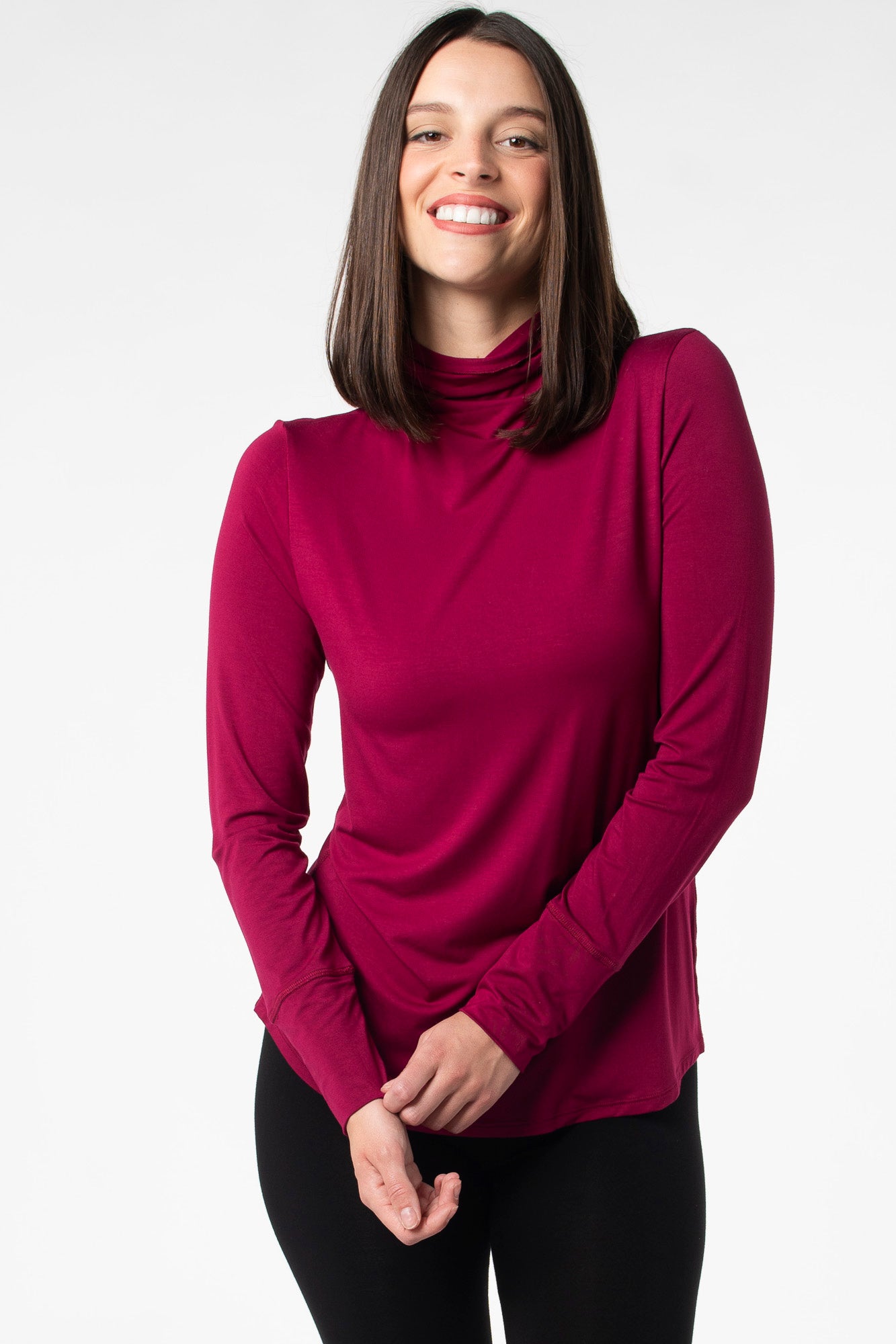 Bamboo long sleeve shirt made of sustainable fabric for sensitive skin. The top features a funnel-neck and long sleeves.