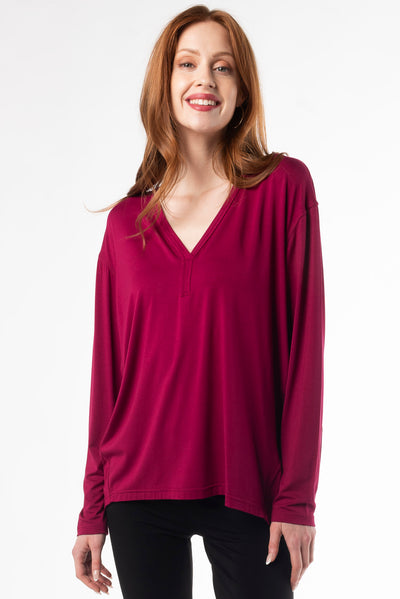 Bamboo long sleeve cocoon top in soft fabric, showcasing a sustainable and stylish eco-friendly top in the colour ‘Beet Red’ for women. 