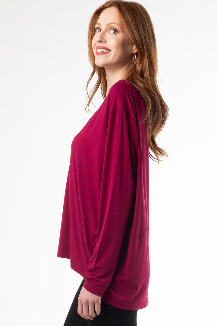 Elegant bamboo long sleeve cocoon top for women. Shown in a bright colour called &