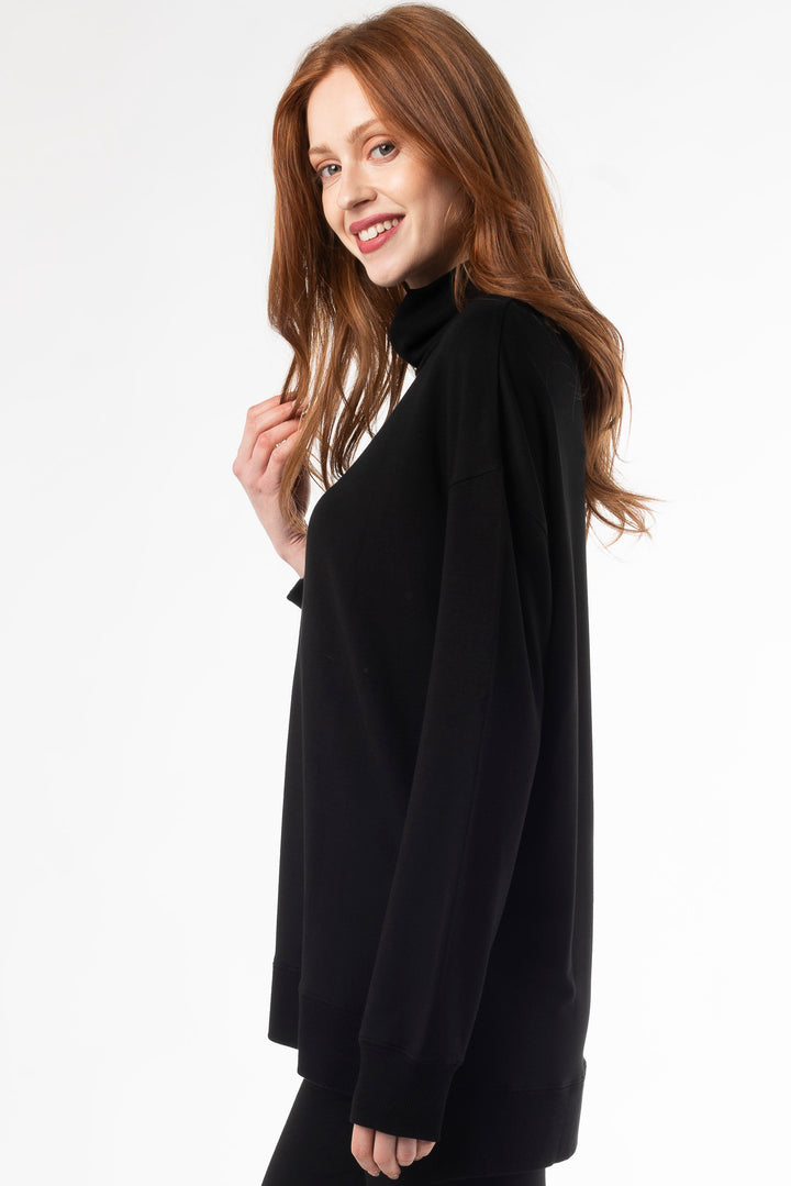 Terrera Zia Turtleneck top in bamboo fabric, combining warmth and sustainability with a sleek, modern design for everyday wear. 