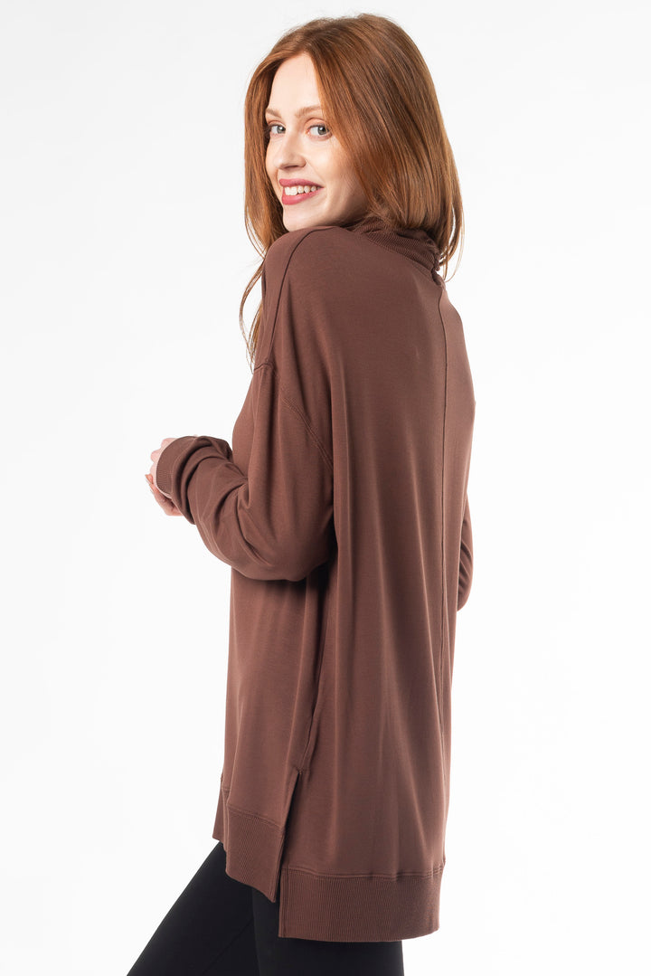 Terrera Zia Turtleneck top in bamboo fabric, combining warmth and sustainability with a sleek, modern design for everyday wear. 