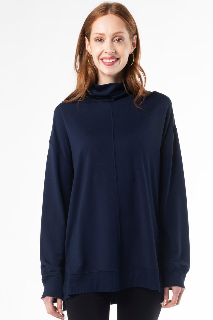 Terrera Zia Turtleneck top in bamboo fabric, combining warmth and sustainability with a sleek, modern design for everyday wear. 