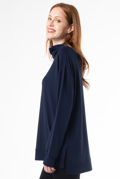 Chic Zia Turtleneck Top by Terrera, featuring sustainable bamboo material in a beautiful navy colour called “ink”. 