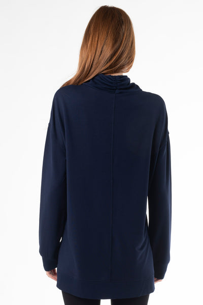 Turtleneck top by Terrera designed with bamboo fabric featured in a beautiful navy tone called “Ink".