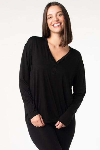 Bamboo long sleeve cocoon top in soft fabric, showcasing a sustainable and stylish eco-friendly top in the colour ‘Black'.