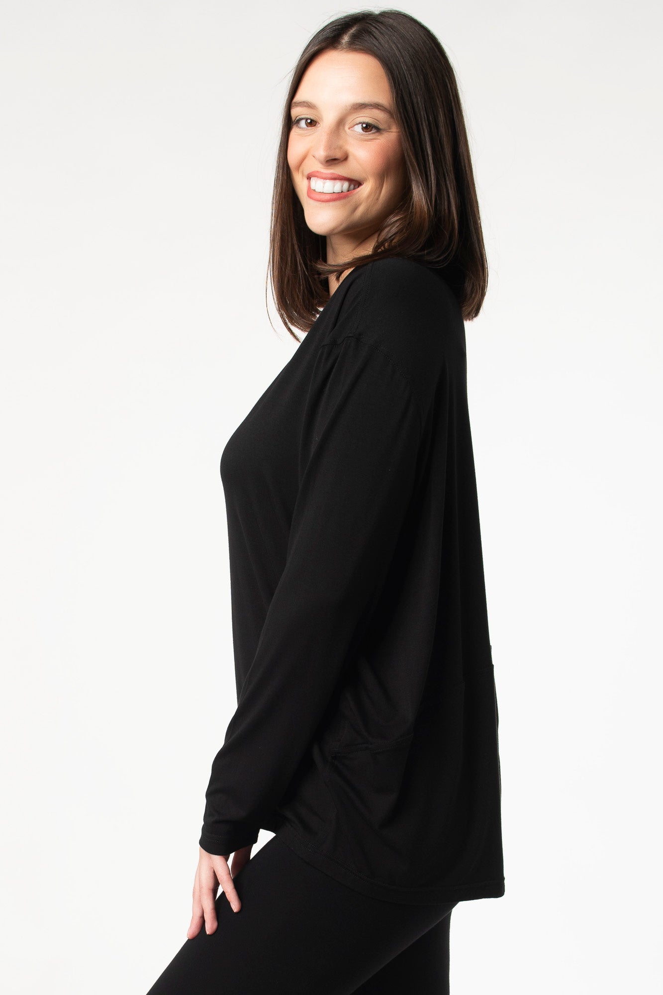 Chic bamboo long sleeve cocoon top, perfect for a comfortable and eco-conscious wardrobe. Shown in the colour ‘Black’.