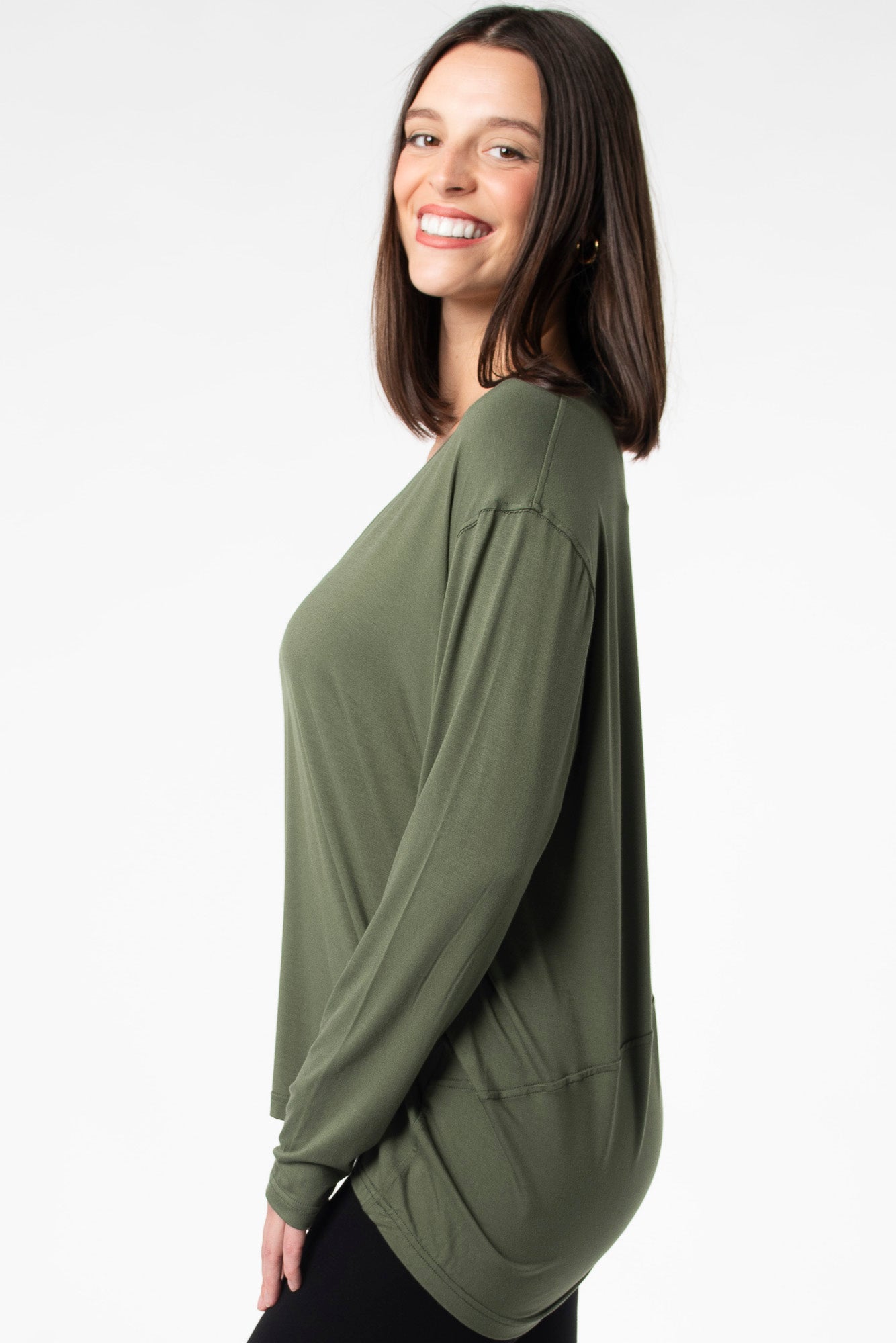 Elegant bamboo long sleeve cocoon top for women by Terrera. Featuring a high-low hem and long sleeves.