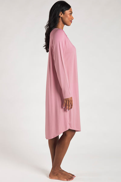 Side view of a woman wearing a soft Pink bamboo sleep dress from Terrera.