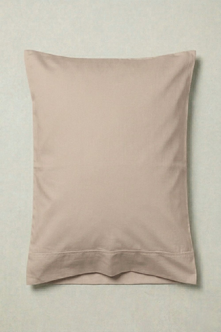Earthy taupe pillowcase on a neutral background