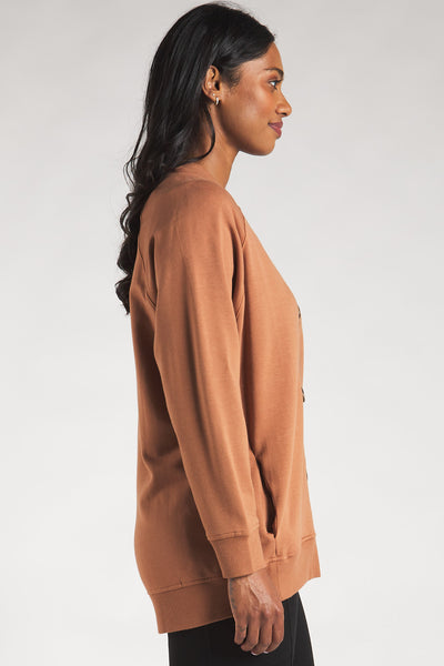 Side view of the Terrera bamboo button-up cardigan in light brown. 