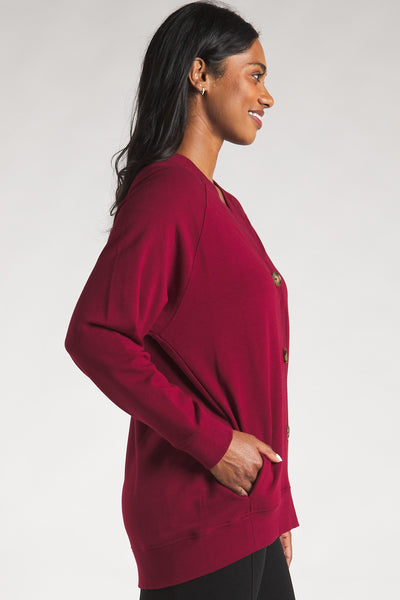 Side view of the Terrera bamboo button-up cardigan in red.