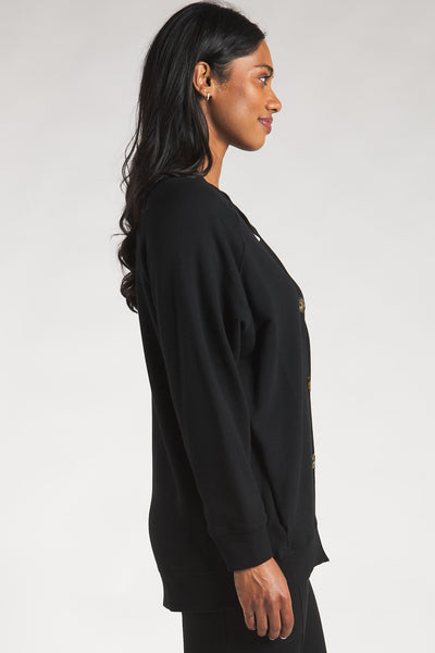 Side view of the Terrera bamboo button-up cardigan in Black. 