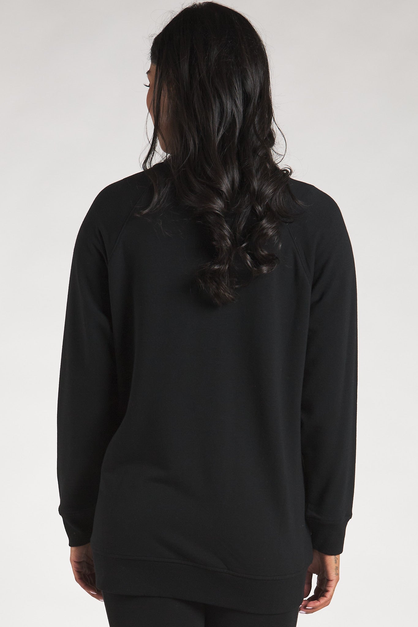 Back view of the Terrera bamboo fleece button-up cardigan in Black.