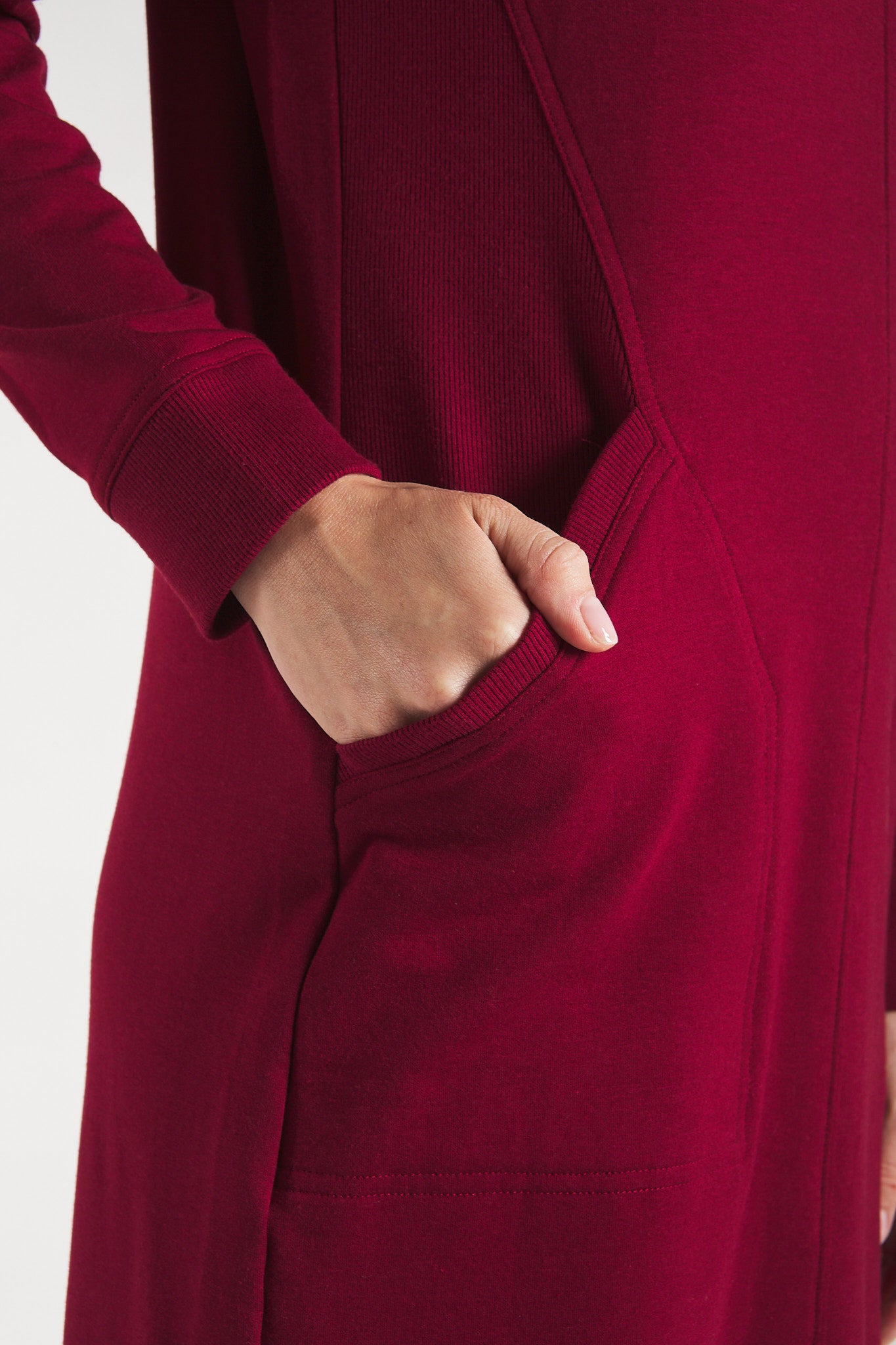 Closeup shot of the pocket detail on the Terrera half-zip fleece dress.