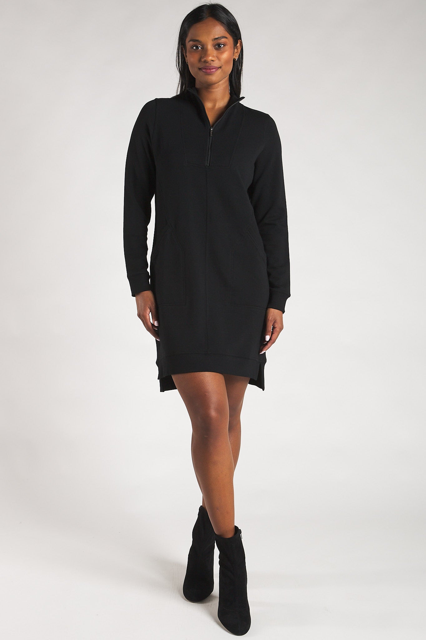 Women’s black half-zip sweater dress made from sustainable bamboo fleece.