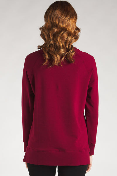 Back view of a soft and sustainable cranberry sweatshirt from Terrera.