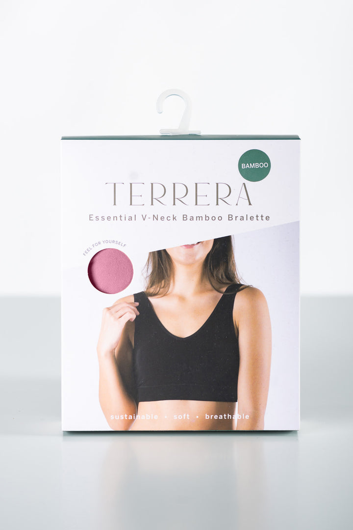 Terrera bamboo bralette packaging with a woman wearing a black bralette on a white background